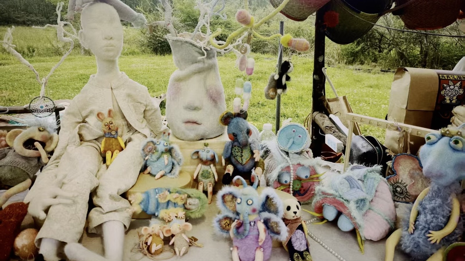 Luna Angel Studio handmade works gathered on an outdoor studio table.