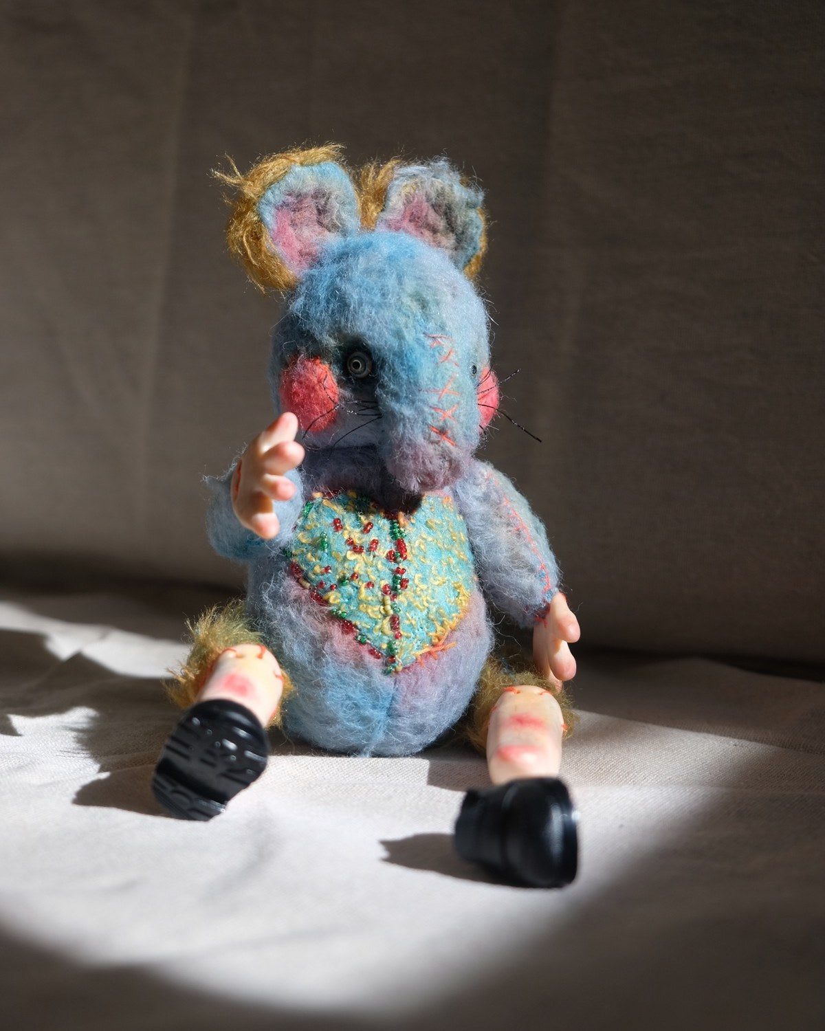 Scale view of Dream Thief as a small collectible handmade art doll.